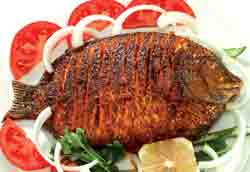 Kerala Karimeen Fry is the pearlspot fish fried in oil after marinating with the unique spices of Kerala 